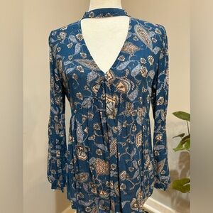 Adorable teal blue, paisley long sleeve top.  Size small.